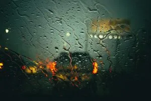 Image of cars driving in heavy rain to illustrate post
