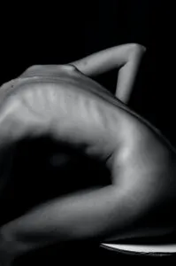 Image of a person bending over to show a stretched back to illustrate post