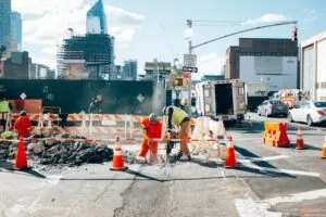 Image of construction workers working on the street to illustrate post