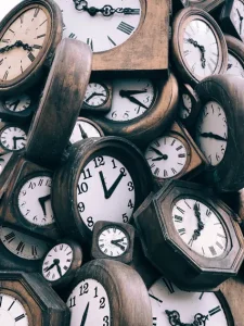 Image of large pile of clocks to illustrate post