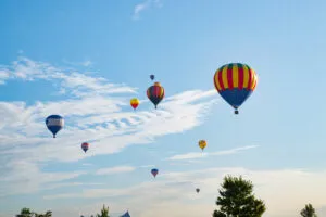 Image of balloons moving across the sky to illustrate post
