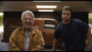 Image of the two lead characters of 'Tuner' film, with the 'Horowitz' piano tuning van in the background, used to illustrate the post.